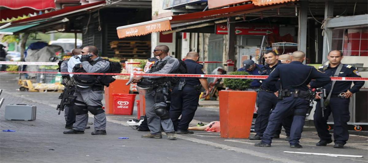 Two dead, five wounded in two Jerusalem attacks: police